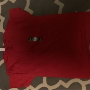 What you have here is a brand new red t-shirt. Size is medium